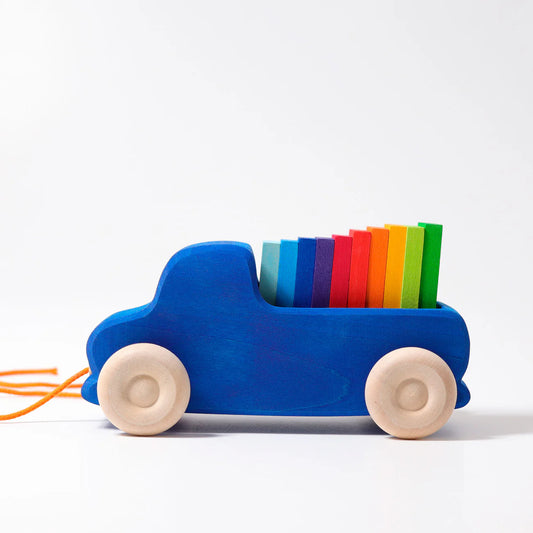 Blue toy car with colorful striped bars on a white background