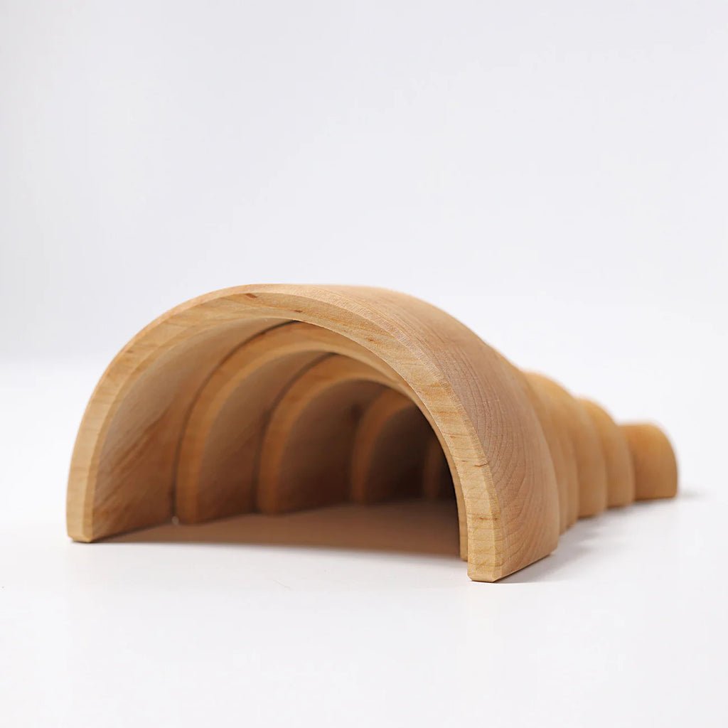 Wooden arch-shaped object on a white background