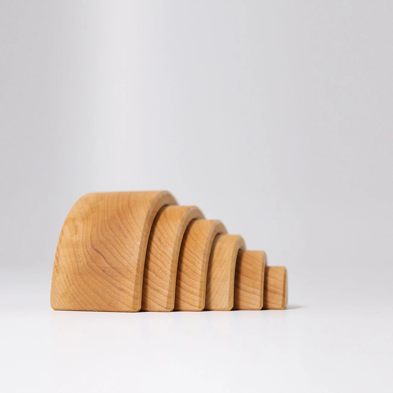 Set of wooden blocks on a light gray background