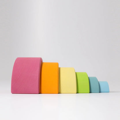 Stack of colorful wooden blocks on a white background