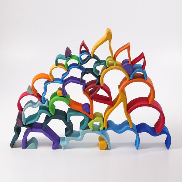 Colorful wooden toys on a white background