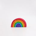 Colorful rainbow-shaped object on a white background