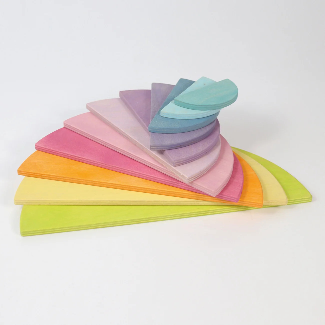 Stack of colorful paper sheets arranged in a fan shape on a white background