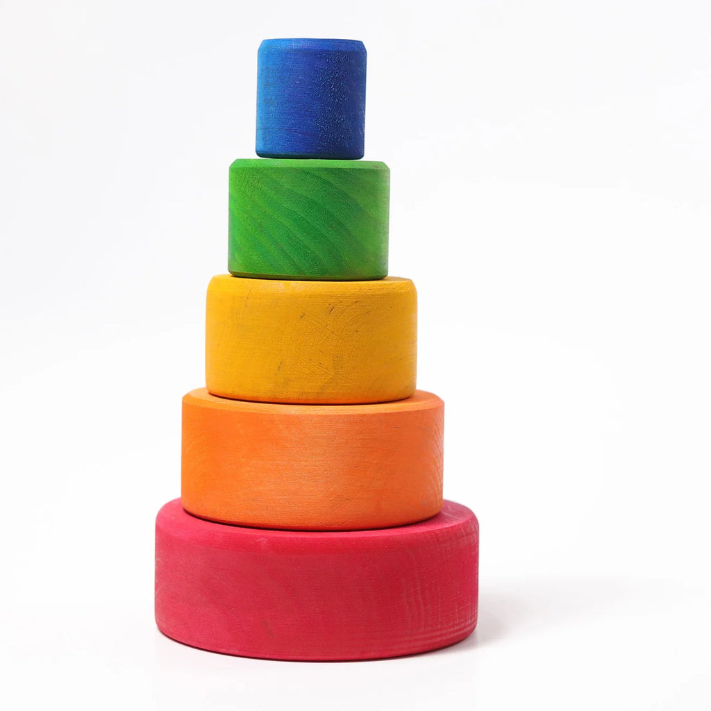Stack of colorful wooden blocks on a white background