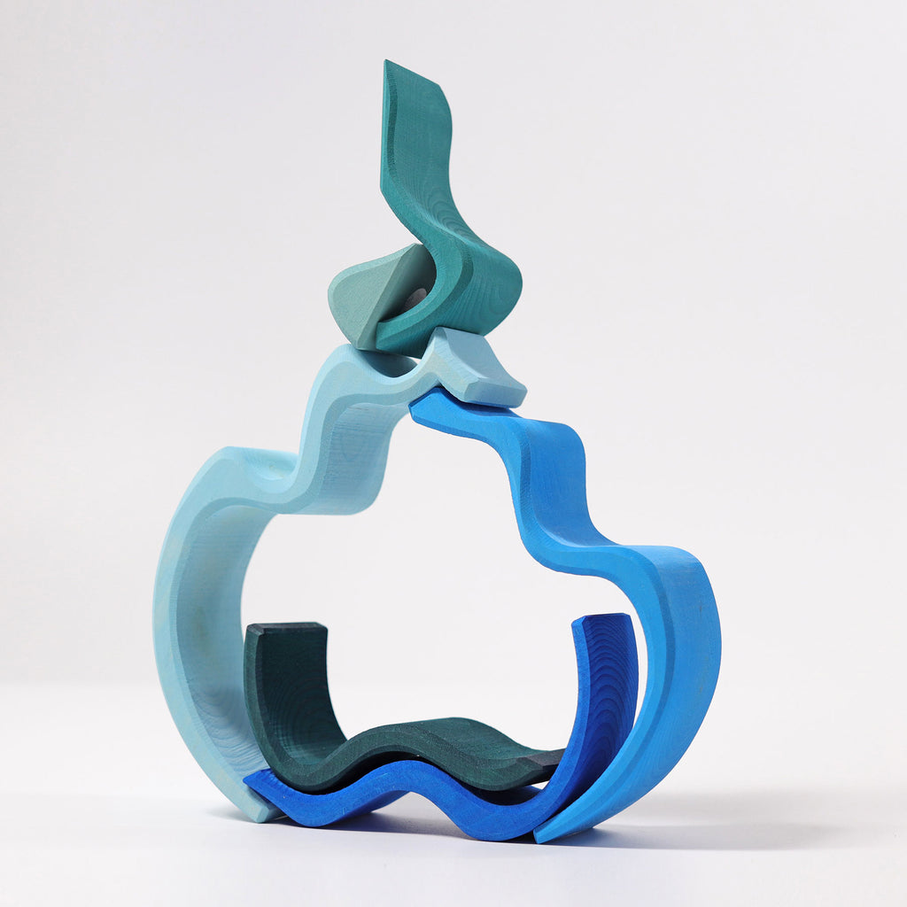 Blue and green abstract sculpture on a white background