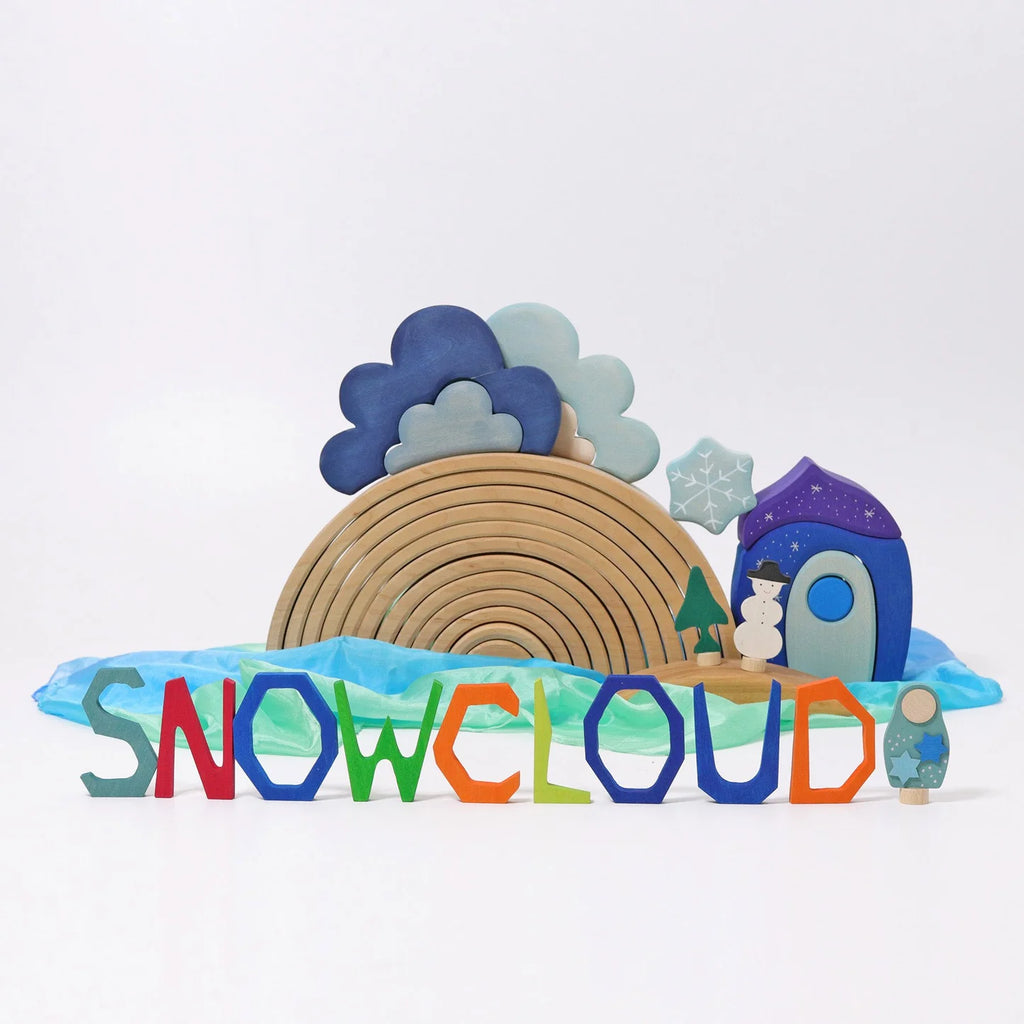 Colorful toy set with 'SNOWCLOUD' on a white background
