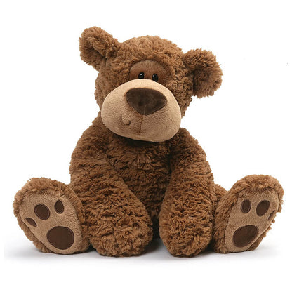 Brown teddy bear on a white background