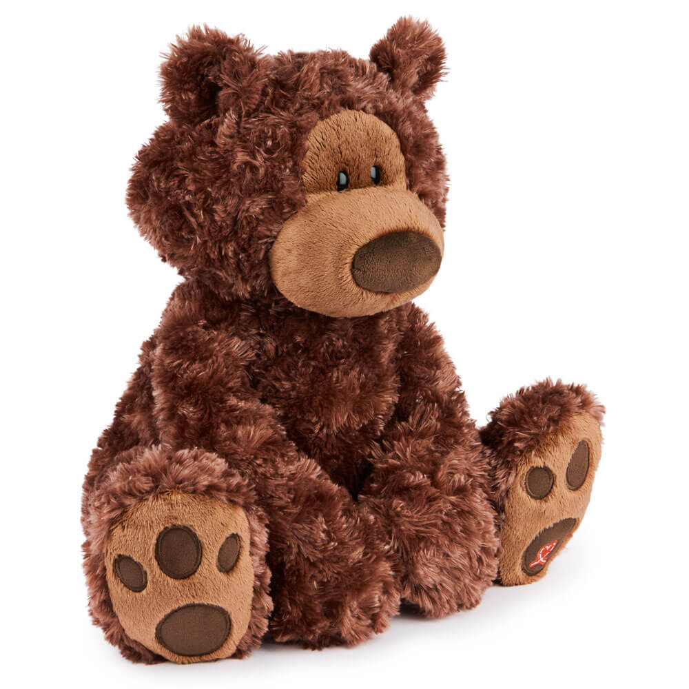 Brown teddy bear plush toy on a white background