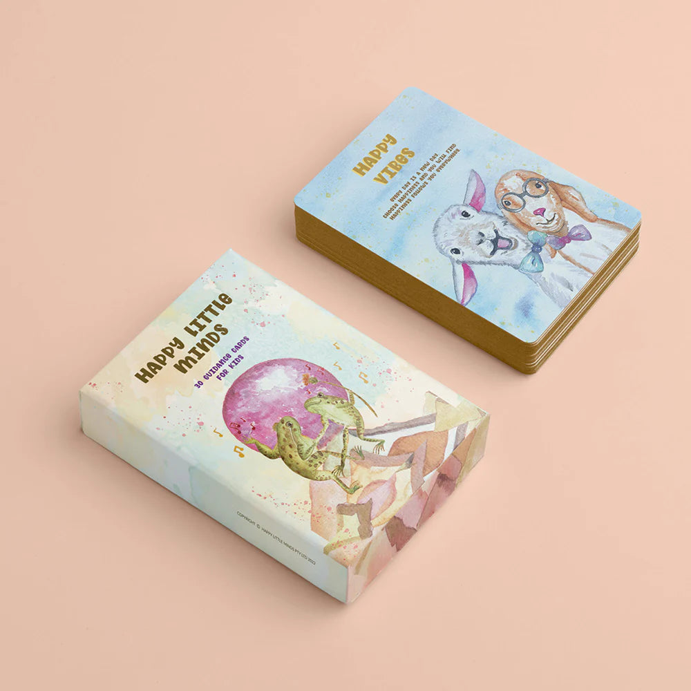 Two card decks with animal illustrations on a beige background