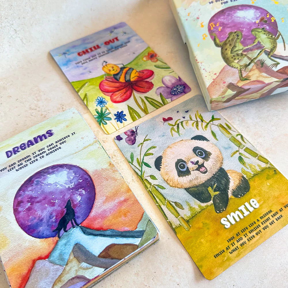 Set of colorful cards with illustrations and text on a light surface
