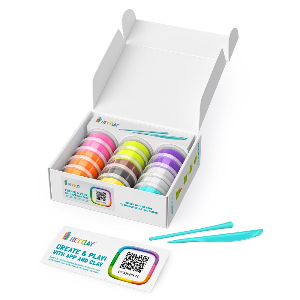 Box of colorful clay strips with a tool on a white background