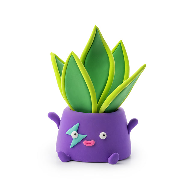 Purple creature with green leaves on a white background