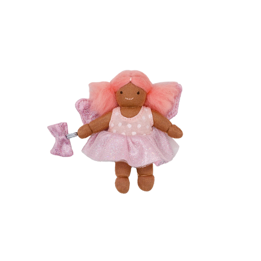 Pink fairy plush toy on a white background