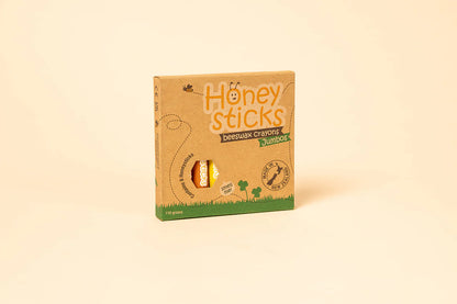 Box of Honey Sticks on a beige background