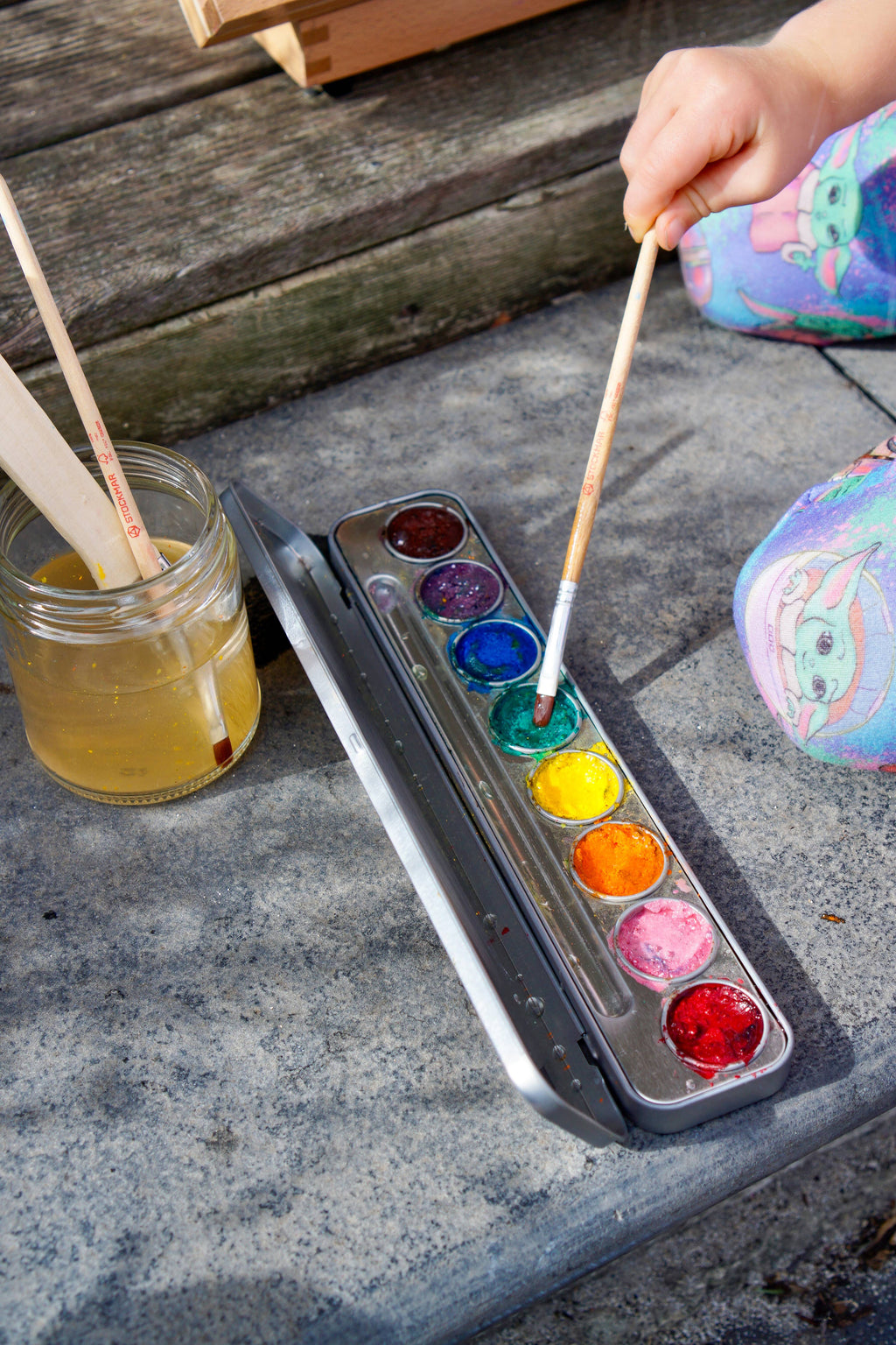Child using Honeysticks - Watercolour Paints