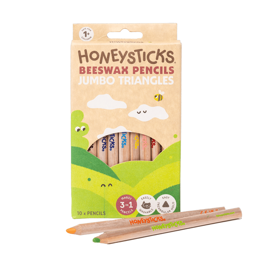 Packaging of Honneysticks Beeswax Pencils with two pencils in front on a white background