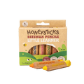 Box of Honeysticks Beeswax Pencils with two pencils displayed in front on a green background