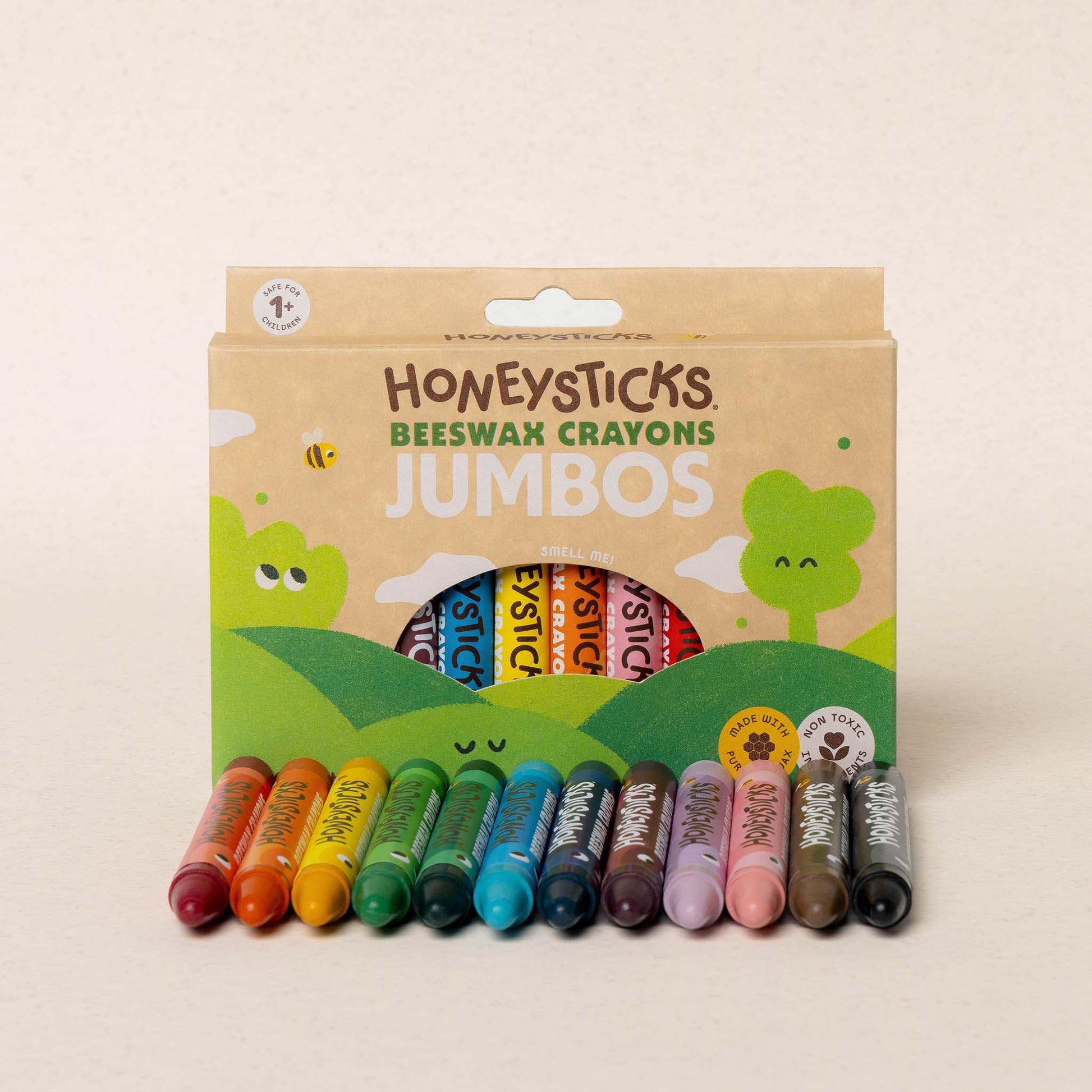 Pack of Honeysticks Beeswax Crayons Jumbos with colorful crayons on a beige background