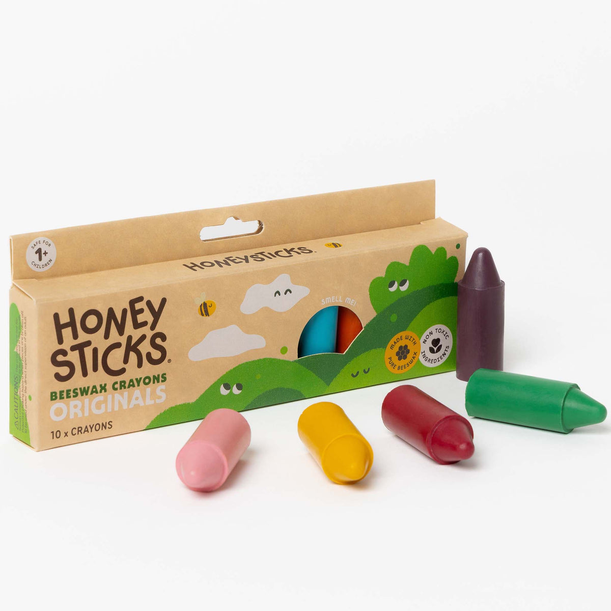 Honey Sticks beeswax crayons packaging with colorful crayons on a white background