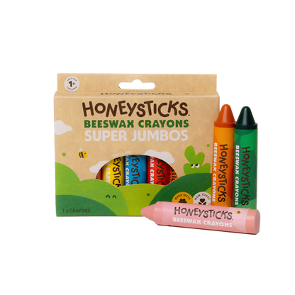 Packaging of Honeysticks Beeswax Crayons with crayons displayed in front on a white background