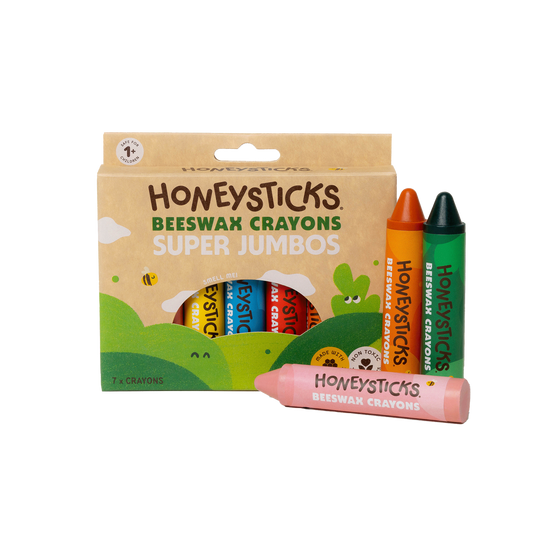 Packaging of Honeysticks Beeswax Crayons with crayons displayed in front on a white background