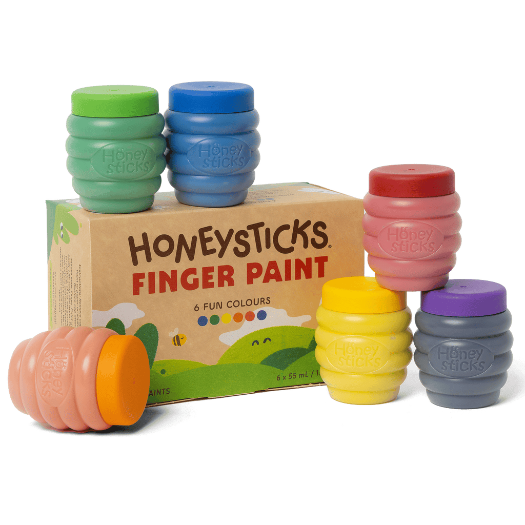 Set of colorful Honeysticks finger paint containers with packaging on a white background