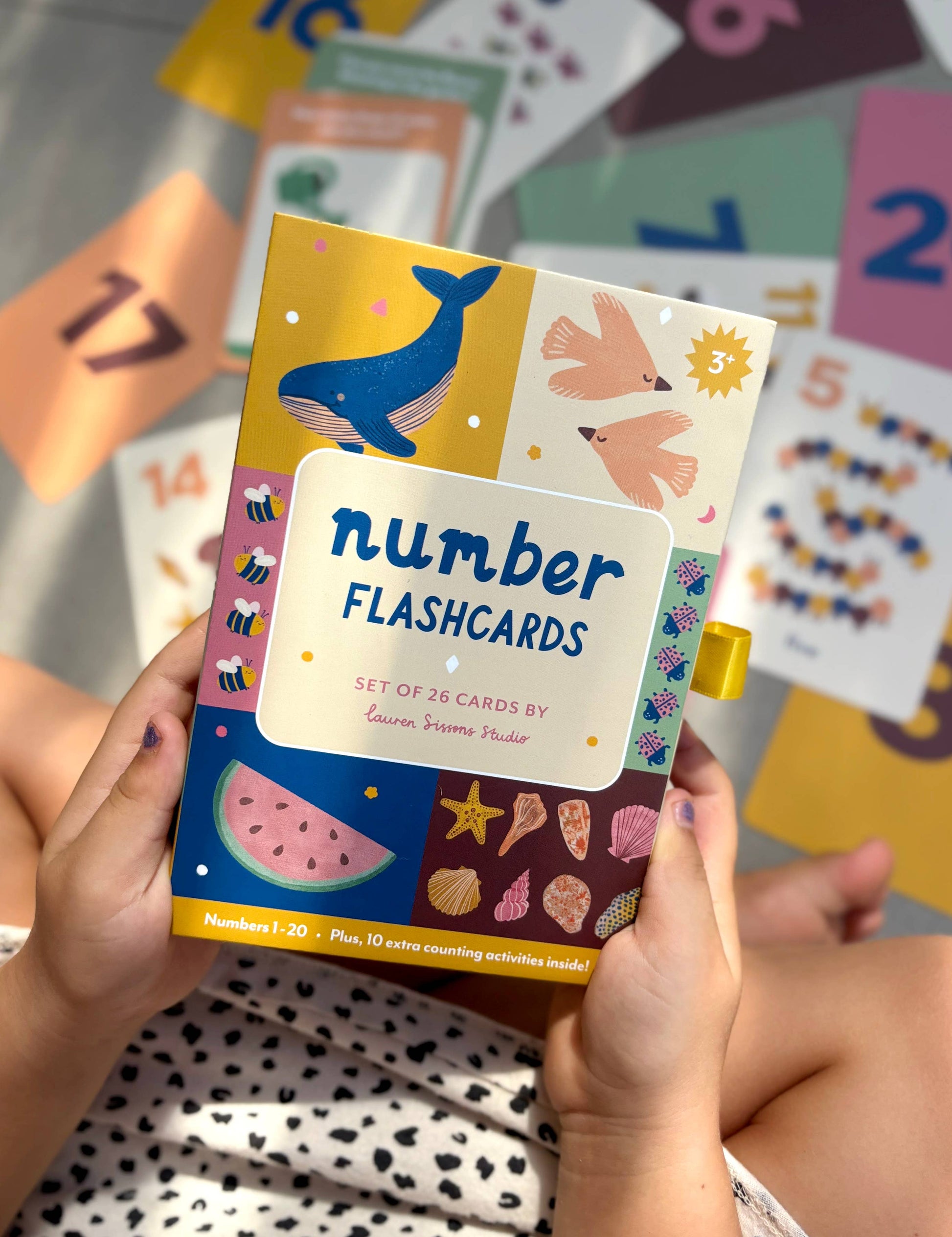 A collection of colorful illustrated flash cards for numbers 1-20 with nature-inspired illustrations, rounded corners, and a title card visible.