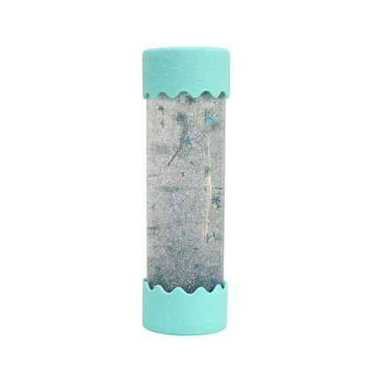 A Baby Calm Down Bottle with a transparent body and blue lid, filled with sparkles and water, providing visual stimulation for infants.