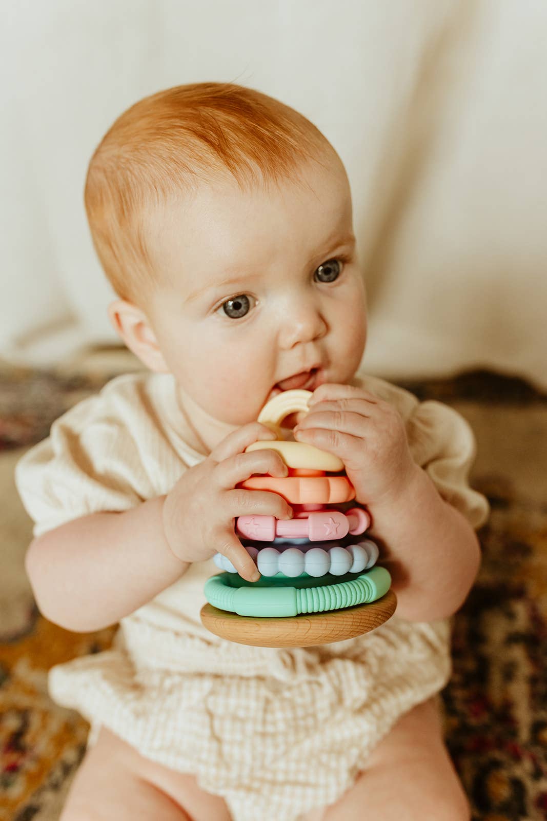Child playing with Jellystone Designs - Wobble Stacker