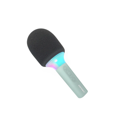Black and green microphone with colorful light on a white background
