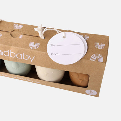 A set of five silicone bath toys in various colors, each shaped like an animal face, displayed in a row.