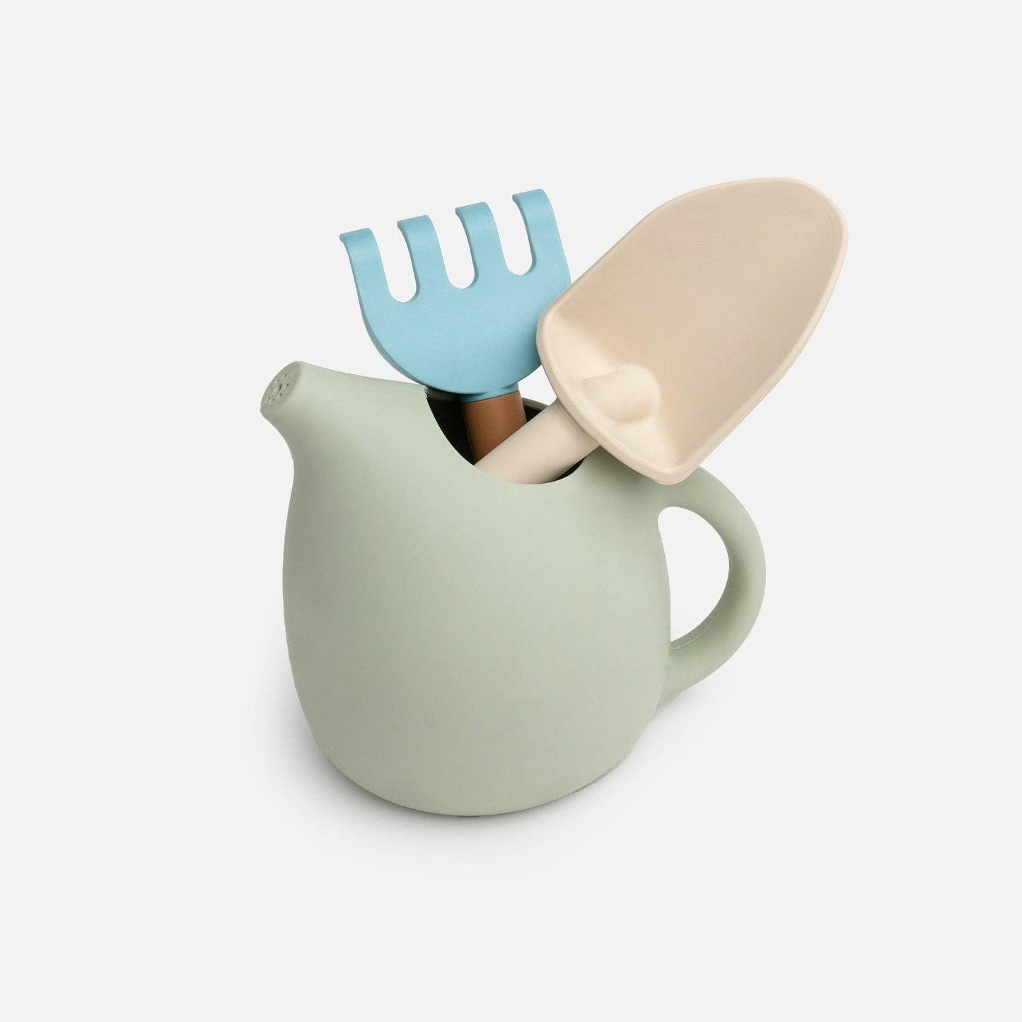 A set of silicone gardening tools including a watering can, a fork, and a trowel, in soft pastel colors.