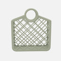A green silicone baby storage bag with a geometric grid design and a loop on top for hanging.