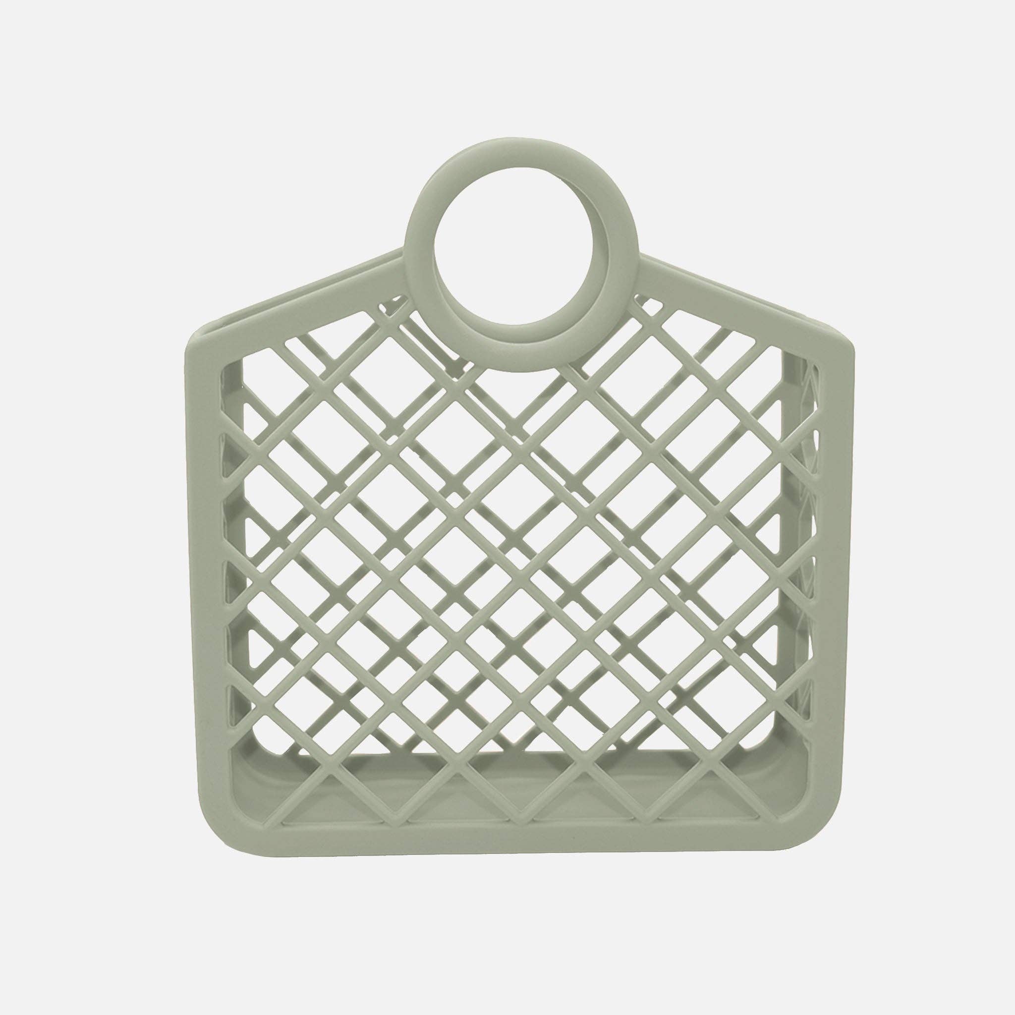 A green silicone baby storage bag with a geometric grid design and a loop on top for hanging.