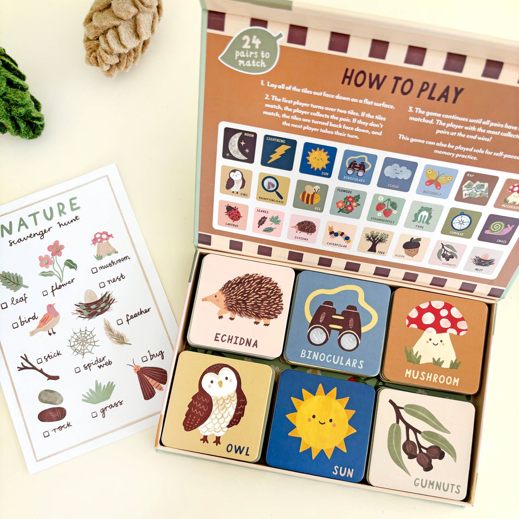 Children's educational game with wooden cards and a 'How to Play' sheet on a light background.