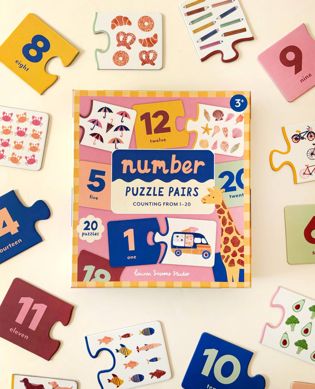 Number puzzle pairs set with colorful packaging on a light background