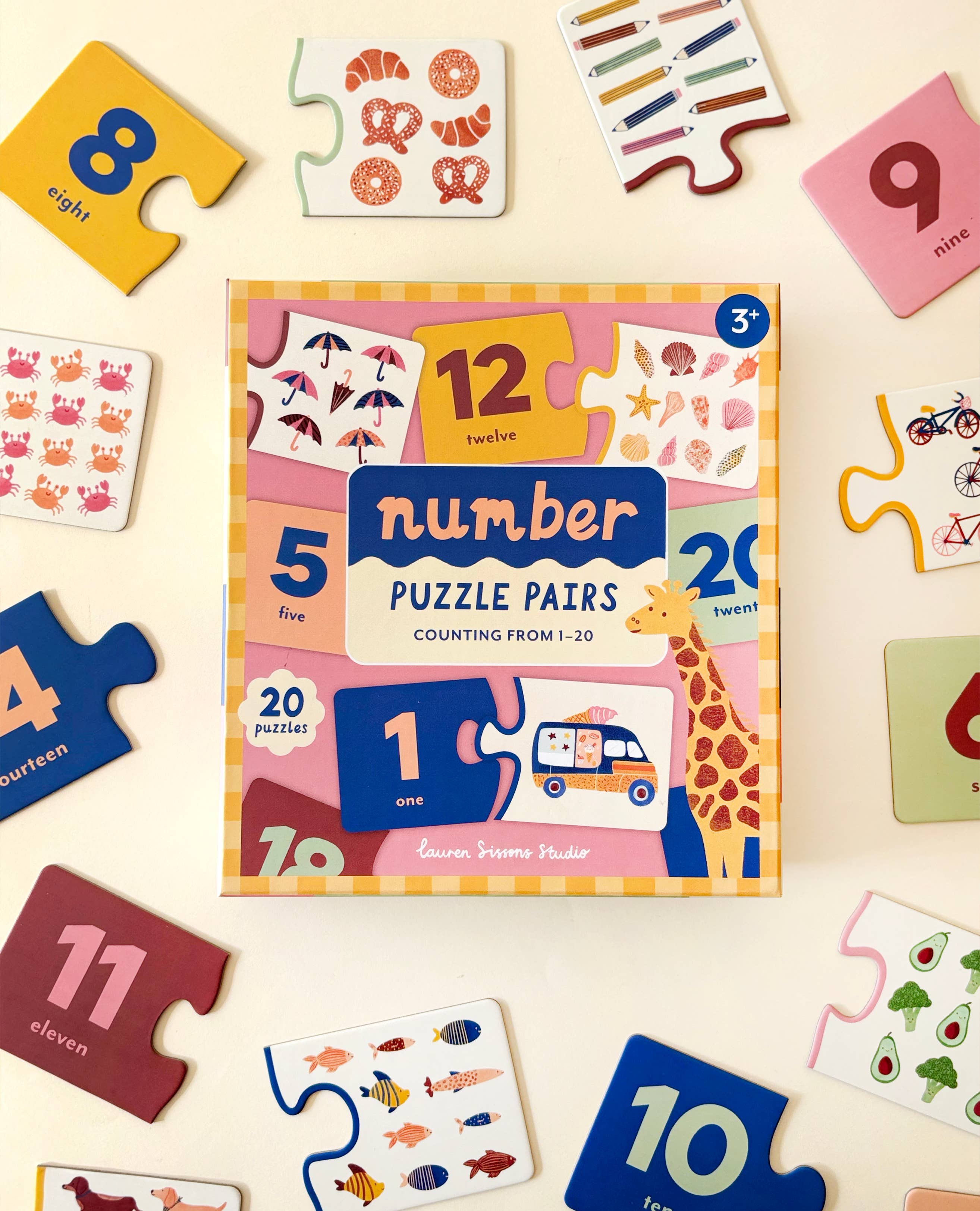 Number puzzle pairs set with colorful packaging on a light background