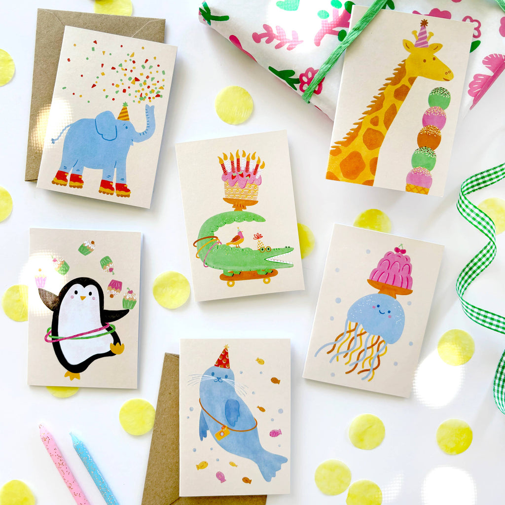 Collection of colorful children's birthday cards with animal illustrations on a white background.