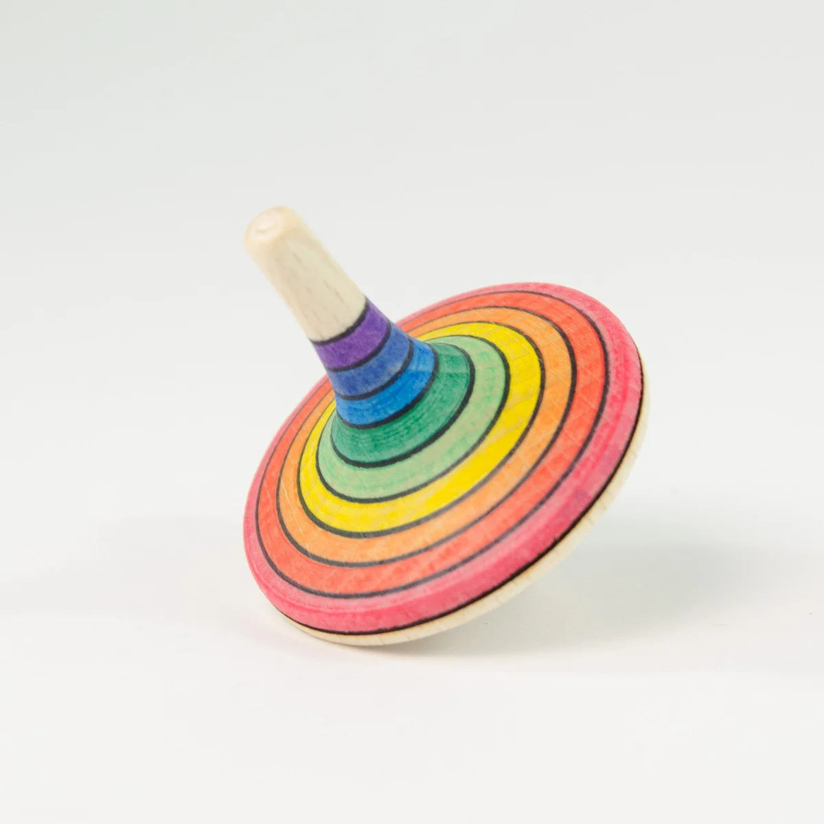 Colourful wooden spinning top on a white background