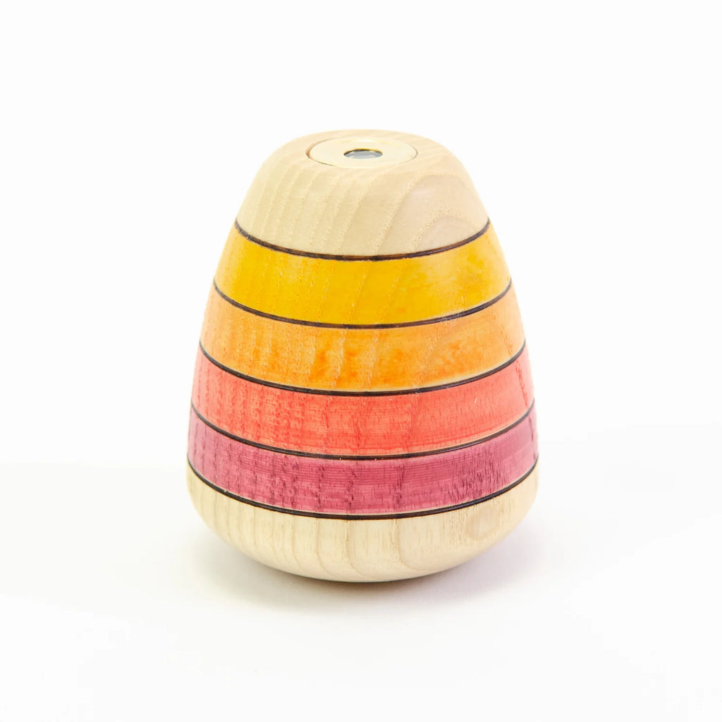 Wooden toy with colorful striped design on a white background