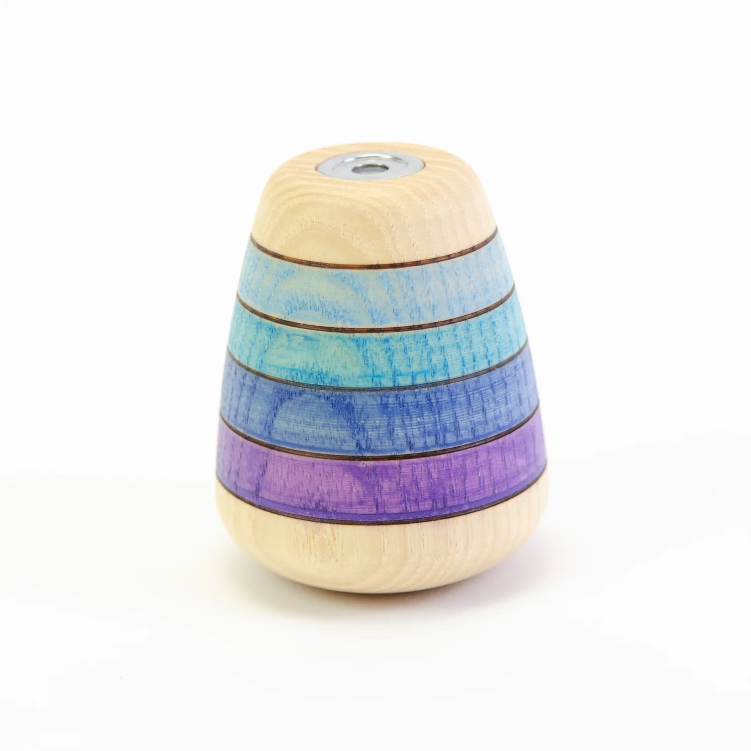 Colorful striped wooden object on a white background