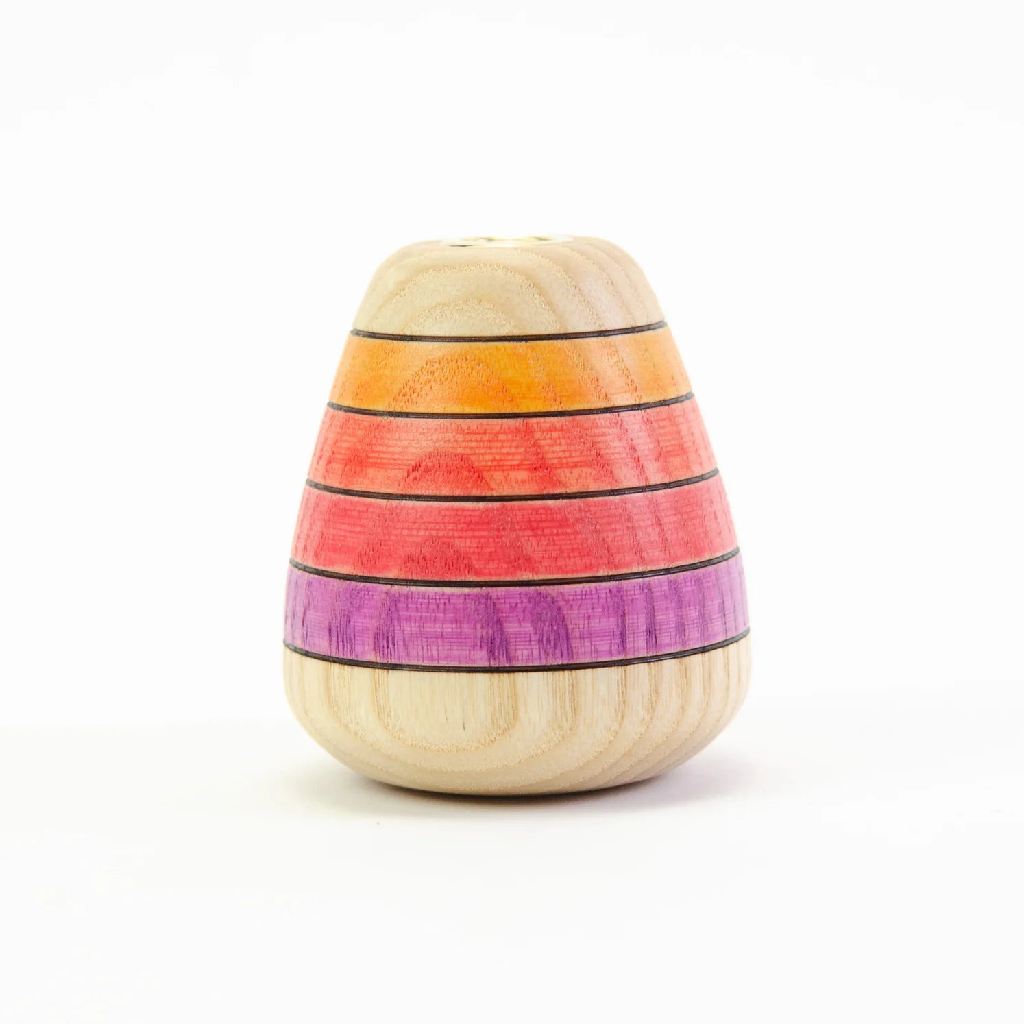 Wooden egg-shaped object with colorful stripes on a white background
