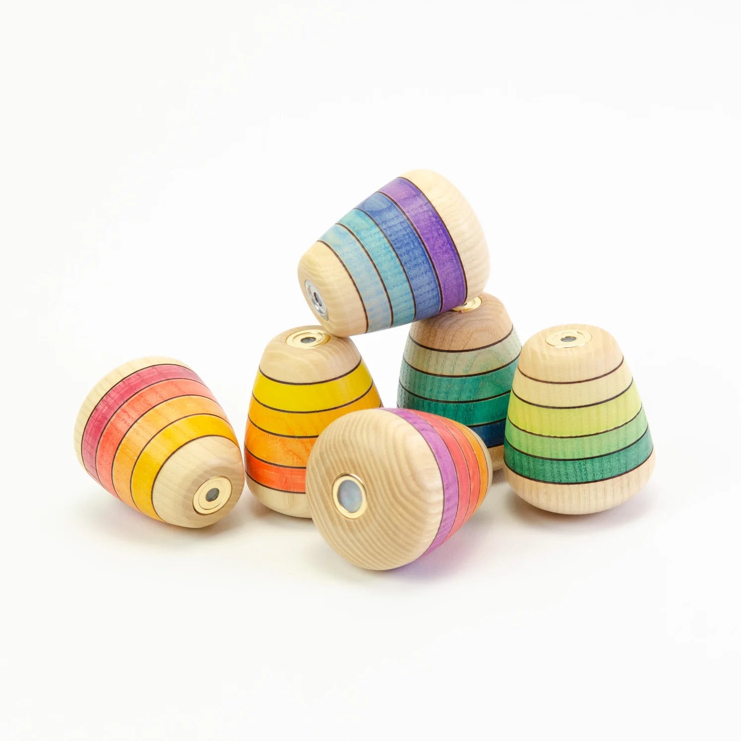 Set of colorful wooden stacking toys on a white background
