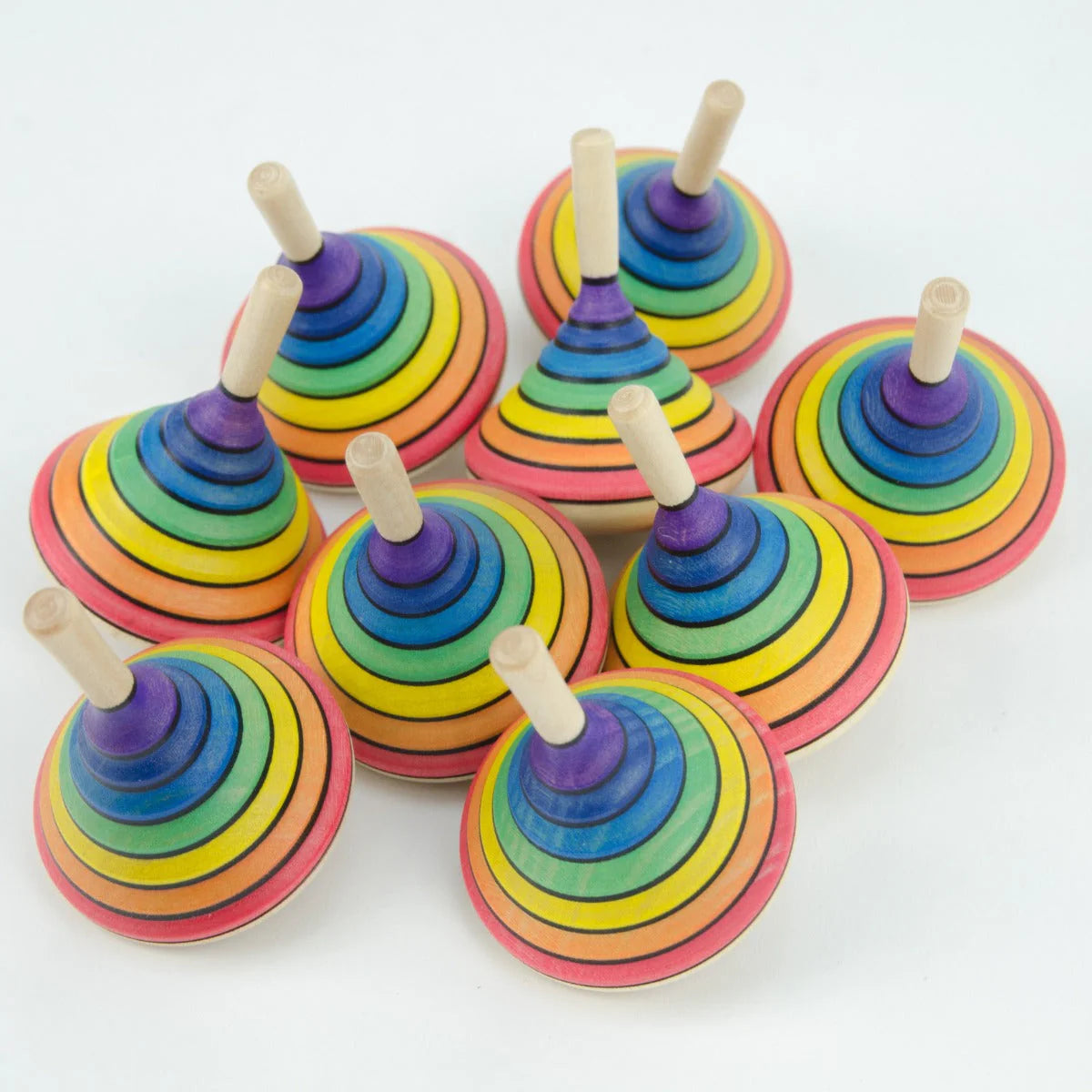 Colorful wooden ring toys on a white background