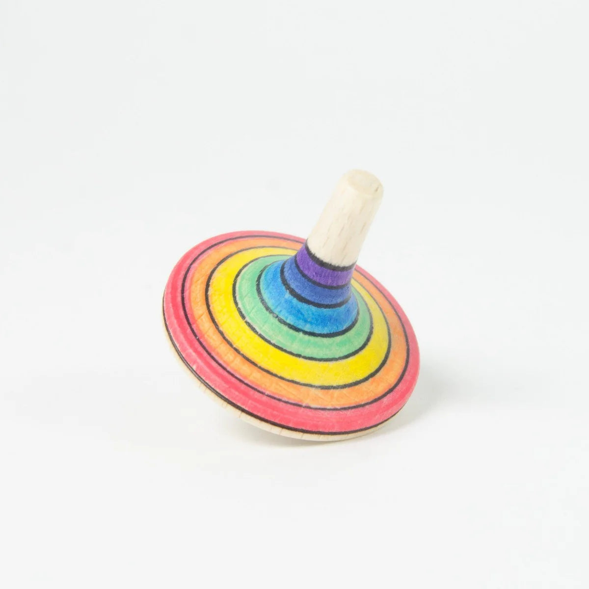 Colorful wooden spinning top on a white background