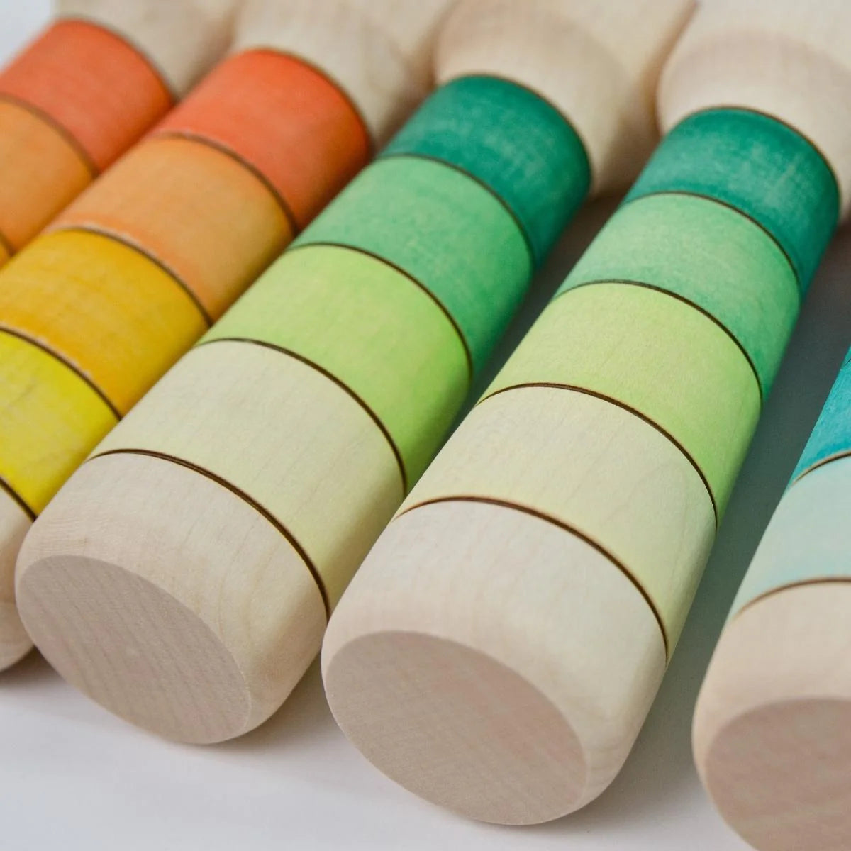 Set of colorful wooden building blocks on a white background