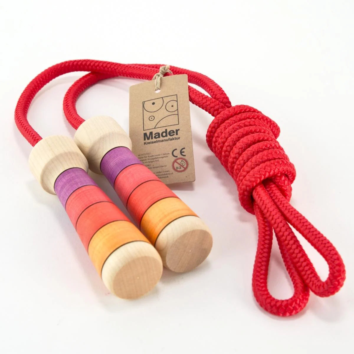 Colorful wooden skipping rope with a Mader brand tag on a white background