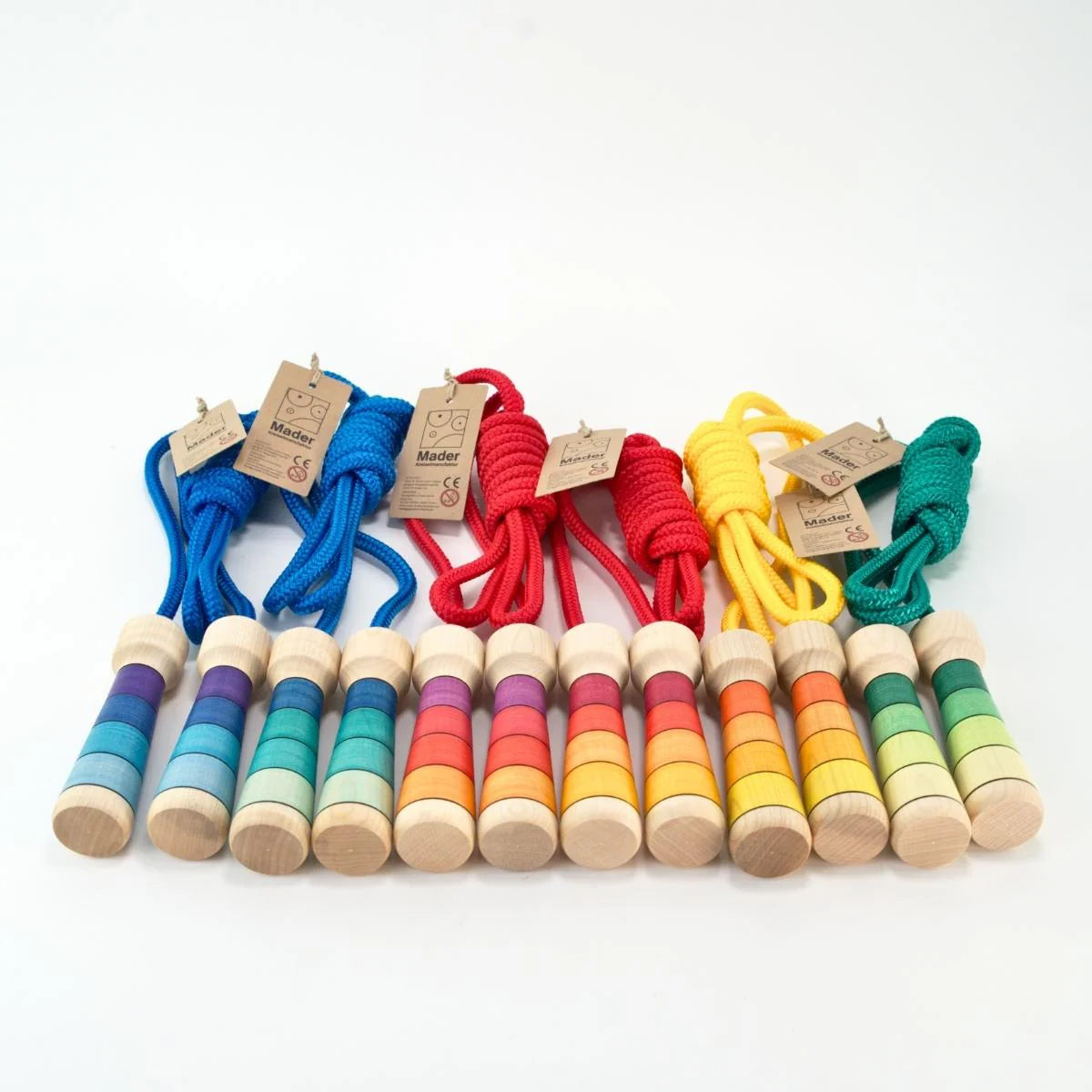 Colorful skipping rope  with wooden handles on a white background 