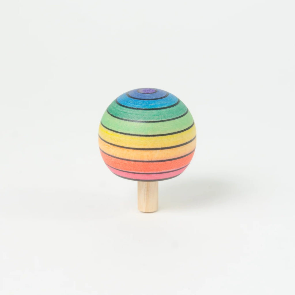 Colorful striped toy on a white background
