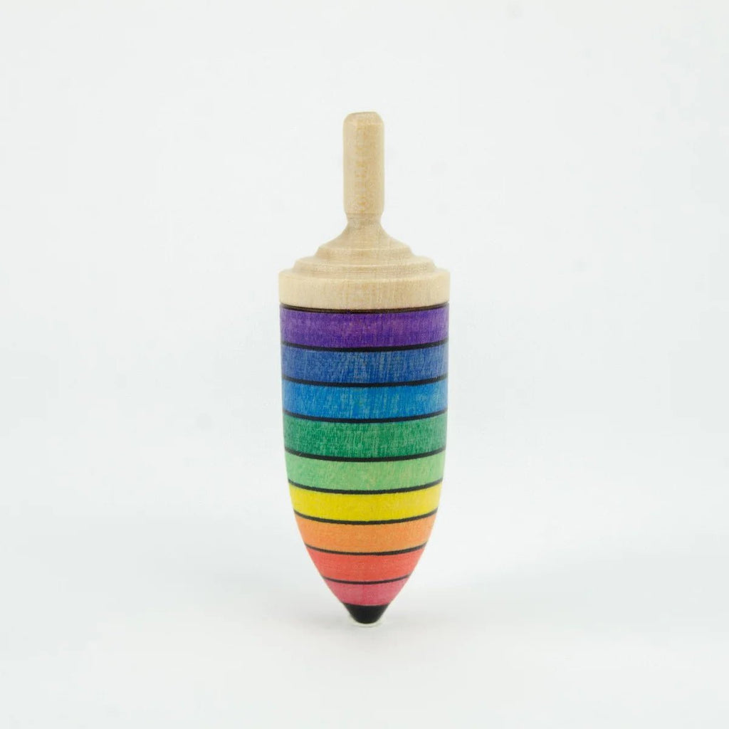 Colorful wooden top with rainbow stripes on a white background